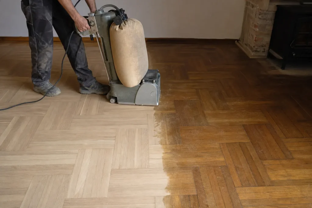 Ponçage d’un parquet ancien en point de Hongrie